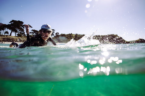 Australian surfer wearing Vilo wooden sunglasses